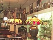 Lamps sitting on a store counter.